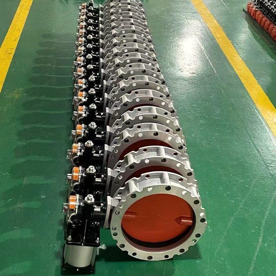 A row of assembled wafer butterfly valves on the floor